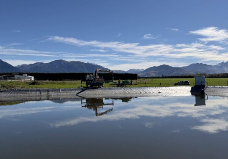 tempImageGtZhDN-2 Dairy effluent pond with surface aerator on a New Zealand farm